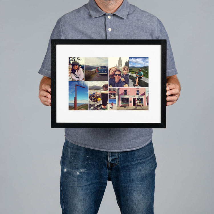 A man holds a bespoke framed custom photo collage print against a solid gray background.
